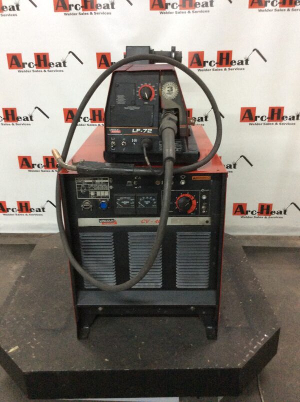 A Lincoln Idealarc CV-400 MIG Welder on a stand.