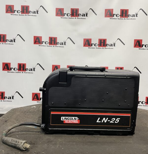 Lincoln Electric LN-25 welding machine on table.