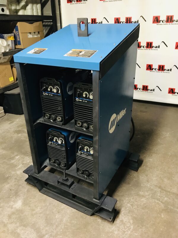 A blue machine with four different types of welding equipment.