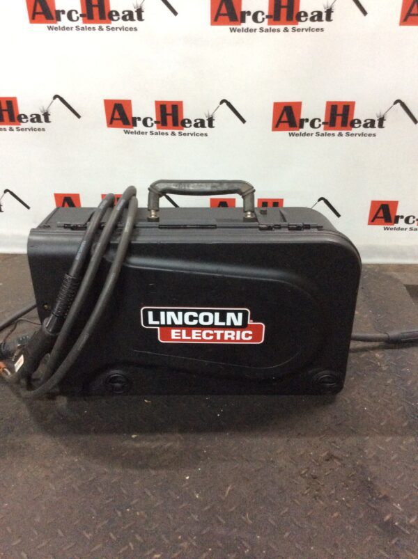 A Lincoln Electric in White Color on a Black Background